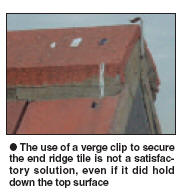 The use of a verge clip to secure the end ridge tile is not a satisfactory solution, even if it did hold down the top surface