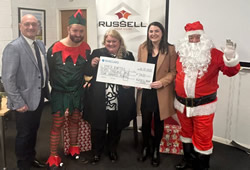 Manufacturer Bring Christmas Cheer to Community Causes